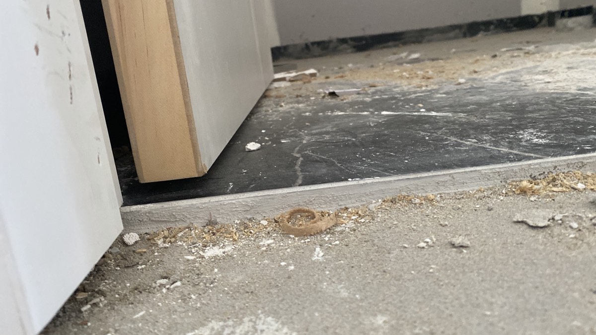 Finish level to waterproofing, recorded during a fixing stage inspection in Austral
