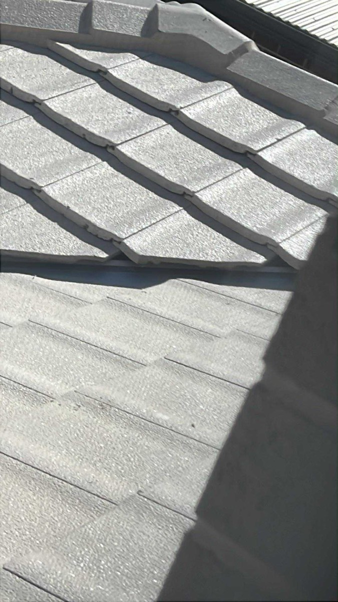 Roof tile needing repositioning, Austral