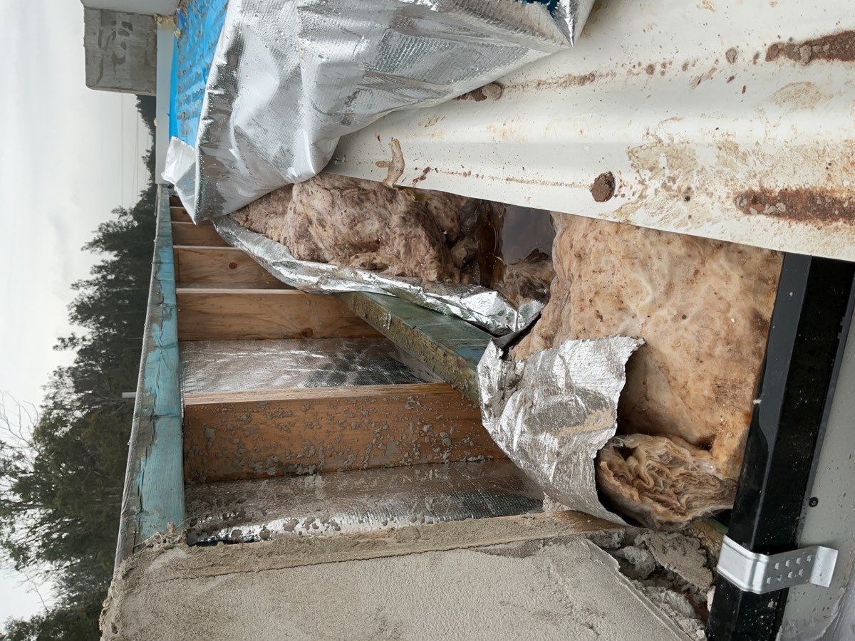 Roof and parapet capping not complete, Austral